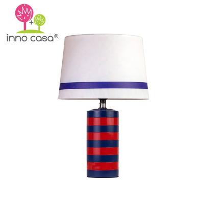 China Modern Indoor Home Design E26/E27 LED Light Bulb Red Fan Gift Barcelona Strips World Cup Table Lamp for sale