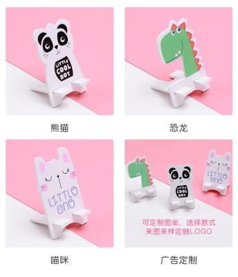 China Adjustable Wooden Hand Made Phone Holder Customized Logo And Design for sale