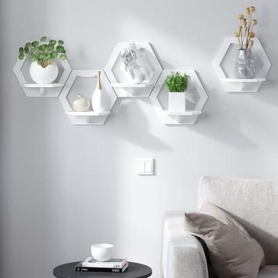 China Wall Free Punching Shelf Free Punching Bedside Wall Mounted Balcony Wall Hanger Wall Background TV Flower Pot Rack Creative for sale