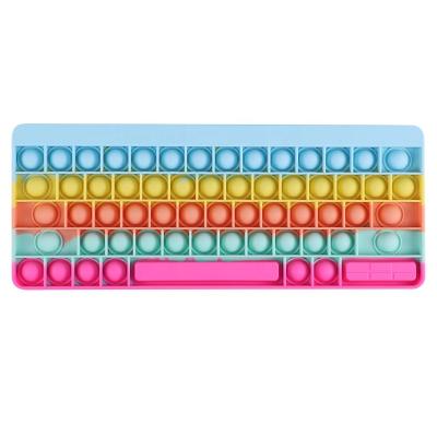 China Hot Selling Food Grade Silicone Amazon Children's Silicone Toy Keyboard Shape Push Noise Moving Person Toy for sale