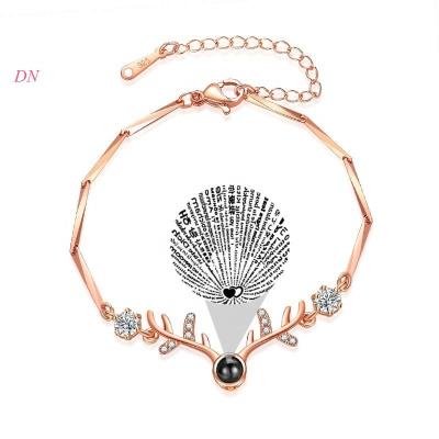China Dina Wholesale Personalized Jewelry Bangle Bracelets Women Main Jewelry 100 Languages TRENDY Deer Photo Projection I Love You for sale