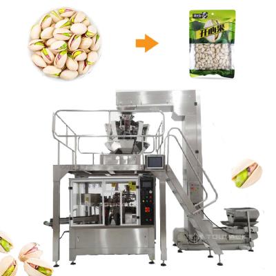 China Máquina de embalaje de relleno de pesas verticales de malvavisco globo ocular jalea de caramelo de ojos máquina de embalaje de sellado en venta