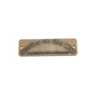 China Sustainable Custom High Quality Scarf Bags Clothes Metal Label With Embossed Logo for sale
