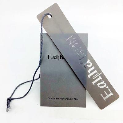 China Sustainable Fashion Clothes Hang Tag Label Custom Plastic Hang Tag PVC With Hang Tag String for sale