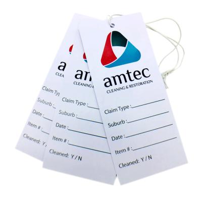 China Sustainable Luxury PVC Price Swing Tags Custom Printed Brand Recycled White Plastic Hang Tag Logo Labels For Garment And Product for sale