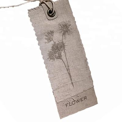 China Sustainable Custom Printing Logo Natural Cloth Organic Cotton Fabric Label With Eyelet for sale