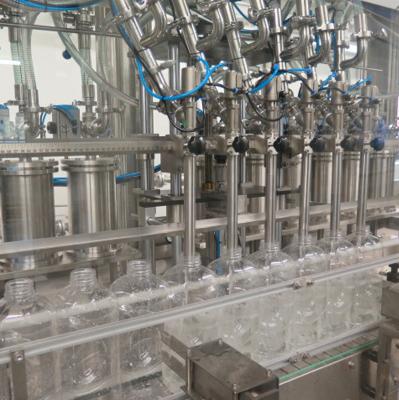 中国 2000-3000BPH 500MLの1台のオイルの注入口およびふた締め機機械に付き自動精油の充填機2台 販売のため