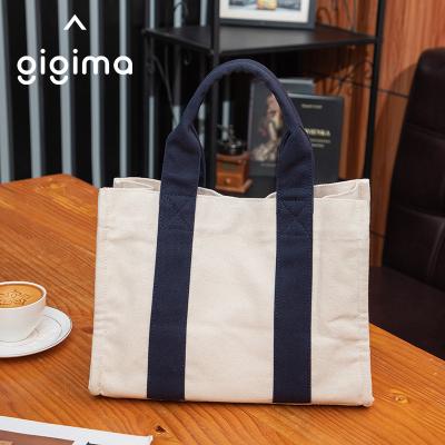 China PORTABLE gigima version spring bag portable diagonal bag single permutation women's Korean bag and summer leisure canvas tote for sale