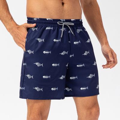 China Custom Made Designer Anti-wrinkle Elastic Men's Sports Fitness Shorts Summer Sexy Men's Seaside Beach Pants for sale