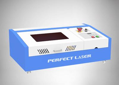 China 40w 50w Mini CO2 Laser Rubber Stamp Engrave Engraving Engraver Machine for sale