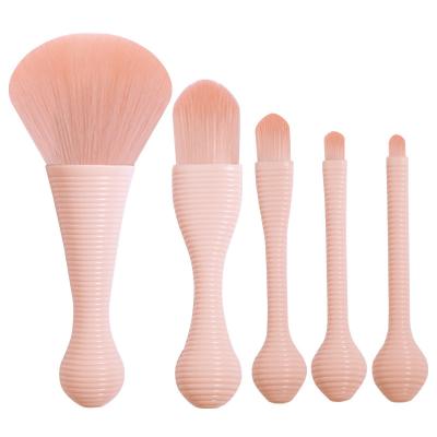 China Angular Blush Anzin 2023 newi 5pcs portable Eco-friendly Soft fiber wool plastic handle makeup brush set with bracket for sale