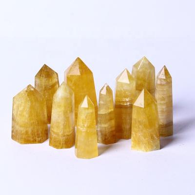 China Wholesale Bulk Natural Stone Fluorite Tower Yellow Fluorite From Europe Crystal Fluorite For Gift for sale