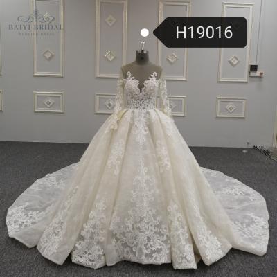 China Long Sleeve Anti-Static Illusion Beads Diamond Elegant Wedding Dresses For Women Bridal Dress Turkey for sale
