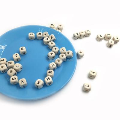 China Eco-Friendly Wooden Letter Alphabet Beads Letter