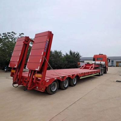 China Low Bed Semi-Trailer with 3 Axis Hydraulic Ladder and Automatic Ramps 40T-100T Load Capacity in South Africa for sale