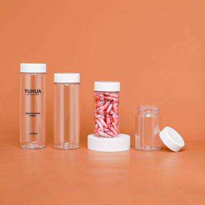 中国 白い帽子空ペット プラスチックびんが付いている円柱プラスチックびんペット材料 販売のため
