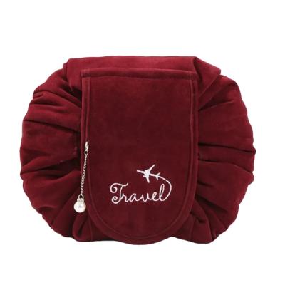 China Vintage BSCI ISO Sedex FAMA Drawstring Makeup Bag Lay Cosmetic Flat Cosmetic Bag Drawstring Bag Custom Logo for sale
