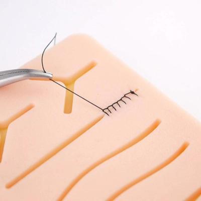 China Suture Practice Pad Medical Nursing School Training Suture Pad Skin Buffing Model Silicone Pad for sale