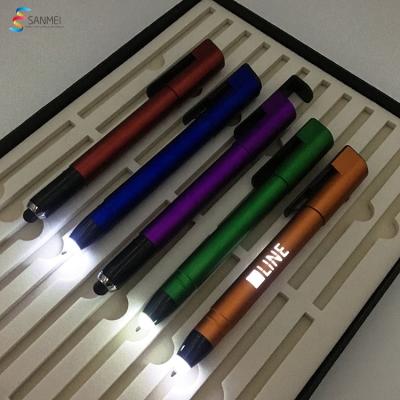 China Promotional Pen Free Samples Wholesale Laser Marked Logo Led Torch Light Up Custom Pens With Logo Multifunction Pens for sale