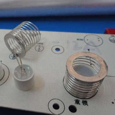 China Coil Contact Damper Spring With Metal Plate For Household Appliances for sale