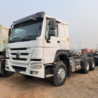 China Sinotruk HOWO 6X4 camión usado Mini camión tractor para sus necesidades de transporte en venta