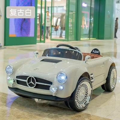 Chine Voiture électrique télécommandée pour enfants 14,5Ah 12 Volt Voiture à batterie pour enfants à vendre