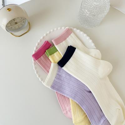 China CT pure color sports socks ladies tube jars cute letters Korean women smiling spring and autumn cotton stockings wholesale for sale