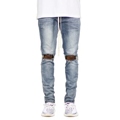China Fashion Sustainable Trend Big High Street Hole Jeans Lace Up Decorative Zipper Mens Jeans for sale