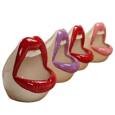 China Hot Selling KTV Smoking Holder Beautiful Big Lips Gagtooth Colorful Ceramic Ashtray Smoking Cigarette Holder for sale