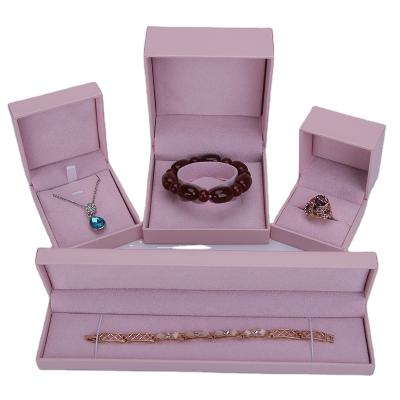 China Best Design Eco-friendly Ring Necklace Packaging Luxury Pink Cardboard Flocking Soft Jewelry Box With Logo Customized Box And Insert for sale