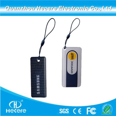 China Duan Frequency Hf (13.56MHz) + UHF (860-960MHz) RFID Epoxy Tag NFC Keychain for sale