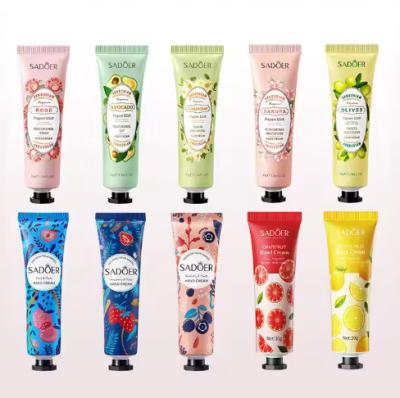 China Grátis Frutas naturais portáteis Ingredientes vegetais Creme para mãos Branqueador Creme hidratante para mãos à venda