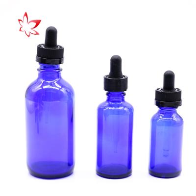 China Cosmetic Industry Cobalt Blue Bottle Glass Dropper Bottle 5ml 10mL 15ml 20ml 30ml 50mL 100mL With Child Cap Glass Fine Oil Bottle for sale