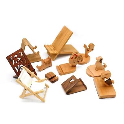 China Wooden Desktop Mobile Phone Holder Walnut Wooden Cell Phone Stand for sale