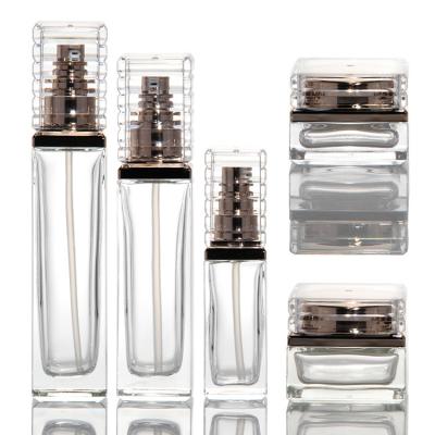 China 30 ml 50 ml 80 ml 100 ml doorzichtige glazen pompfles voor serum essentiële olie parfum lotion Te koop
