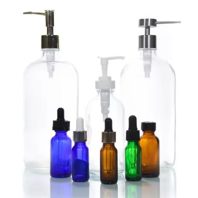 China 120 ml 250 ml 500 ml lege helder glas cosmetische lotion Boston ronde spuitfles Te koop