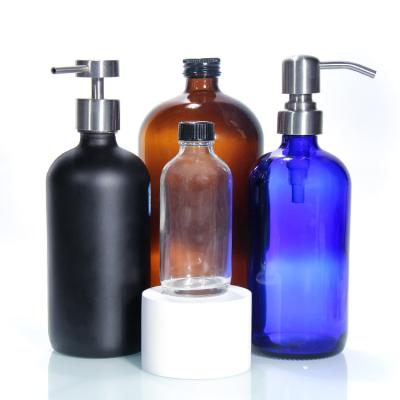 China Kleurloze luxe glasfles Glasfles met pomp lotion Glas cosmetische flessen Te koop