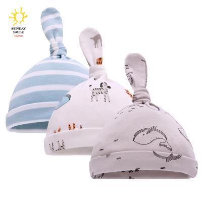 China Picture Newborn Baby Beanie Top Knot Stretchy Soft Organic Cotton Hats for sale