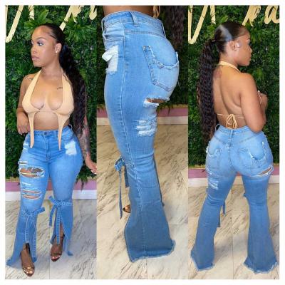 China Breathable Newcomers Fashion Skinny Light Blue Denim Flare Pants Ripped Distressed Jean Women for sale