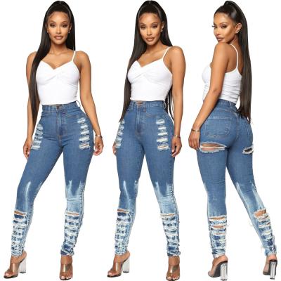 China Breathable In Autumn Long Pants Women Denim Running Blue Jeans Spring Hole Fly Zipper Mid Waist Pants KG6528 2021 for sale