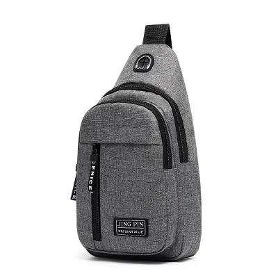 China Earphone Hole Trunk Sling Messenger Bag Cross Body Leisure Shoulder Bag With Earphone Hole for sale
