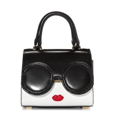 China New fashion beauty face fashion spliced women bag cartoon personality design unique handbag for sale