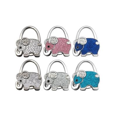 China Hot Selling Handbag/Purse Hanging Metal Elephant Purse Hook Bag Hanger Creative Zinc Alloy Hook for sale