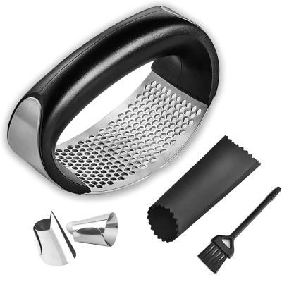 China Amazon Sustainable Plant 5 Piece Multifunctional Garlic Press Stainless Steel Rocker Garlic Garlic Crusher Kitchen Tools for sale