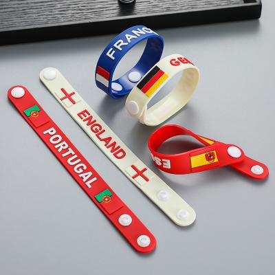 China Acrylic 2022 Qatar decoration national team rubber bracelet hand rope fans small gift souvenirs France for sale