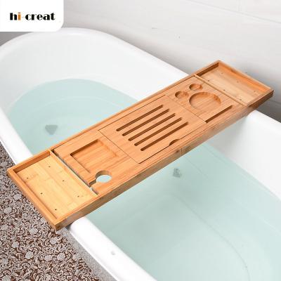 China Amazon Wooden Tray Natural Bamboo Bathroom Bed Sustainable Hot Extendable Tub Cart for sale
