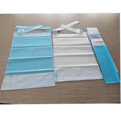 China Disposable Pe+tissue patient bib/patient apron for hospital use/dental apron for old people for sale