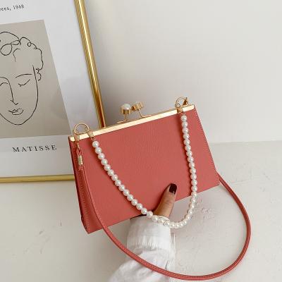 China 2021 Fashion Simple Design Women Lady Box Handbag Frame Coin Purse Handbags With Pearls Handle for sale
