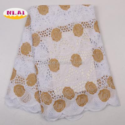 China 2019 Viable High Quality White And Gold African Dry Lace Cotton Embroidery Lace Fabrics With Stones for sale
