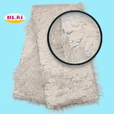 China Viable New Arrival Hot Selling African Brocade White Lace With Feather Floral Jacquard Woven Fabric for sale